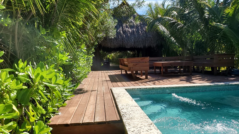 Coral-Views-Becash-side-community-pool-with-palapa-and-deck